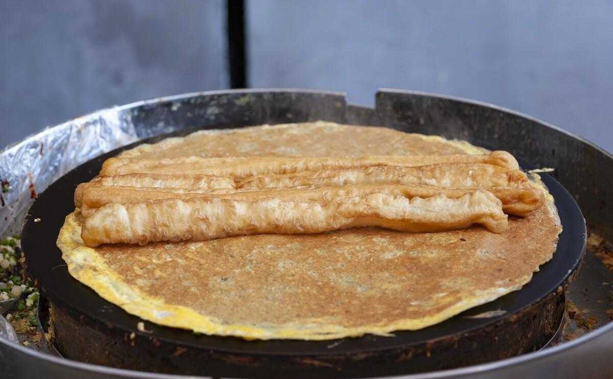 煎饼果子_煎饼王和煎饼哥哪个好_煎饼哥煎饼